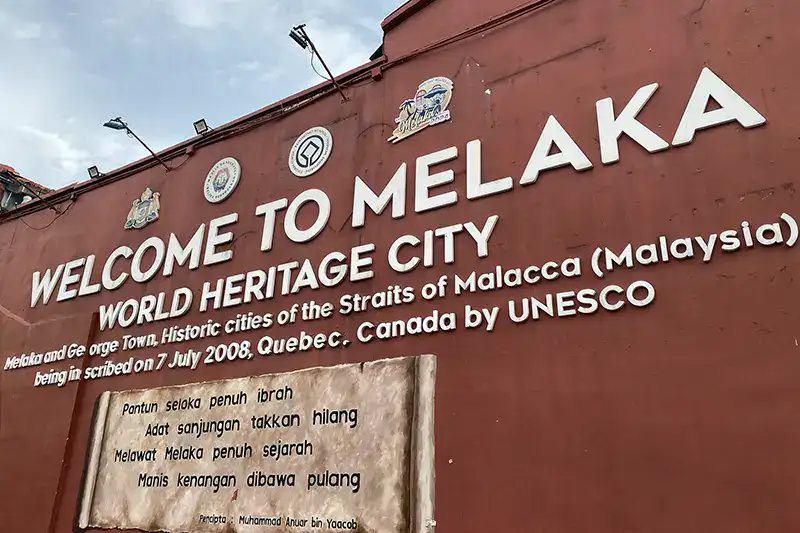 Welcome sign to Malacca, a UNESCO World Heritage City and one of the top cultural day trips from Kuala Lumpur, showcasing the city’s historical significance.