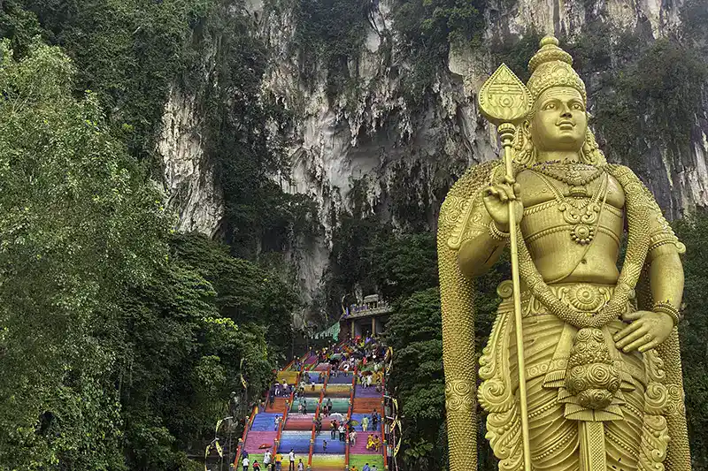 Batu Caves Malaysia with Lord Murugan statue and colorful staircase – top cultural attraction in Peninsular Malaysia