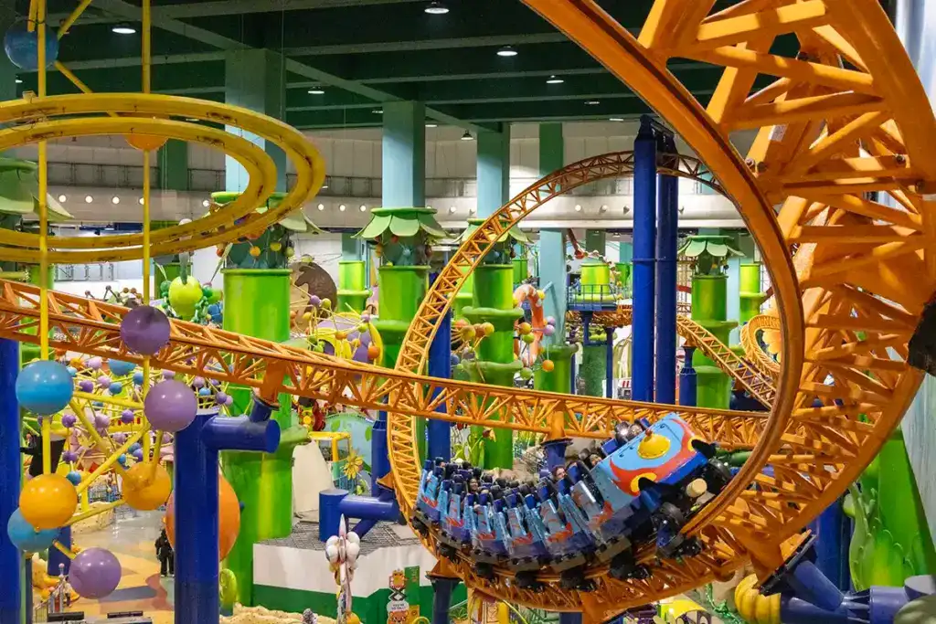 Indoor roller coaster at Berjaya Times Square Theme Park in Kuala Lumpur, showing colourful rides and family-friendly attractions inside one of the city’s largest shopping malls.
