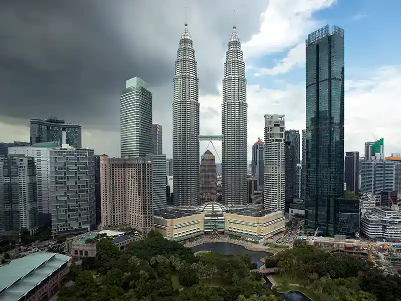 Petronas Twin Towers overlooking Kuala Lumpur city skyline