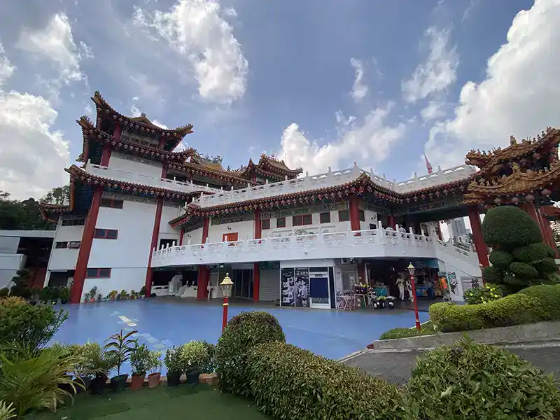 A panoramic view of the Petronas Twin Towers rising above the Kuala Lumpur city skyline. This iconic landmark is a must-visit attraction for travellers exploring top Kuala Lumpur destinations, offering stunning architecture, city views, and easy access to KLCC Park and Suria KLCC.