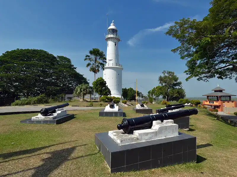 Bukit Melawati lighthouse and historic cannons overlooking Kuala Selangor